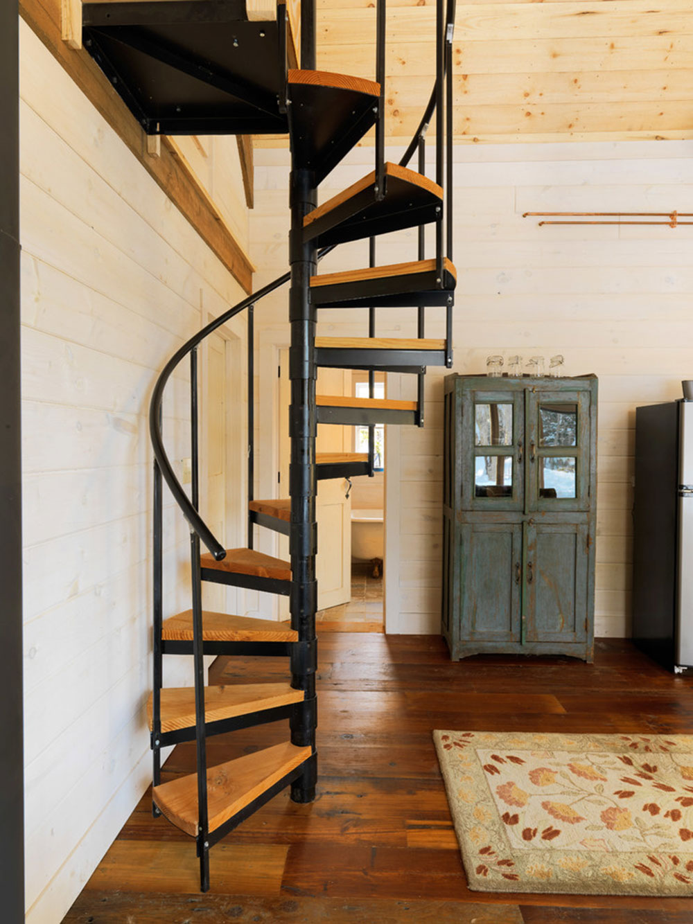 Rustic-Wood-Cabin-by-Silver-Maple-Construction-LLC Spiral Staircase: Pictures and Things You Should Know About Them