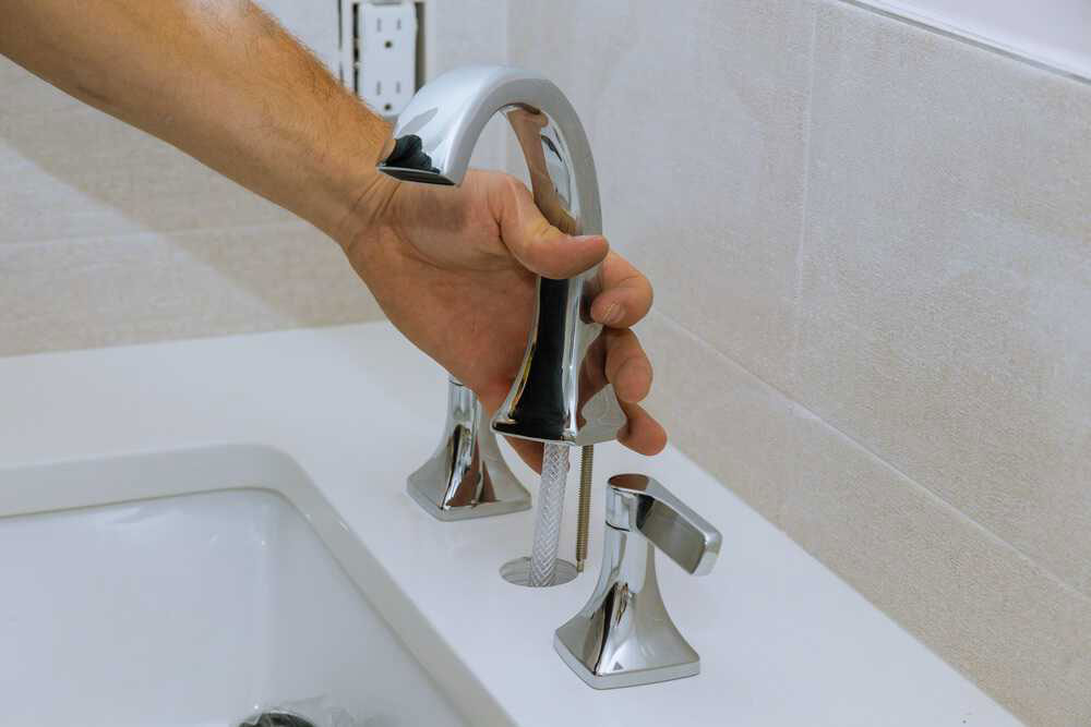 replacing faucet in bathroom sink