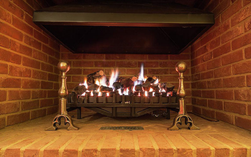 How big should the pilot light be on a gas fireplace?